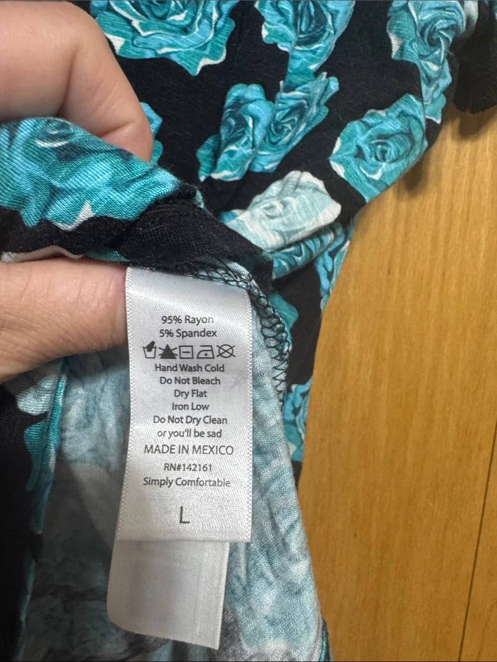 LuLaRoe Teal & White Rose Print Short Sleeve Olive Tee - Picture 3 of 5